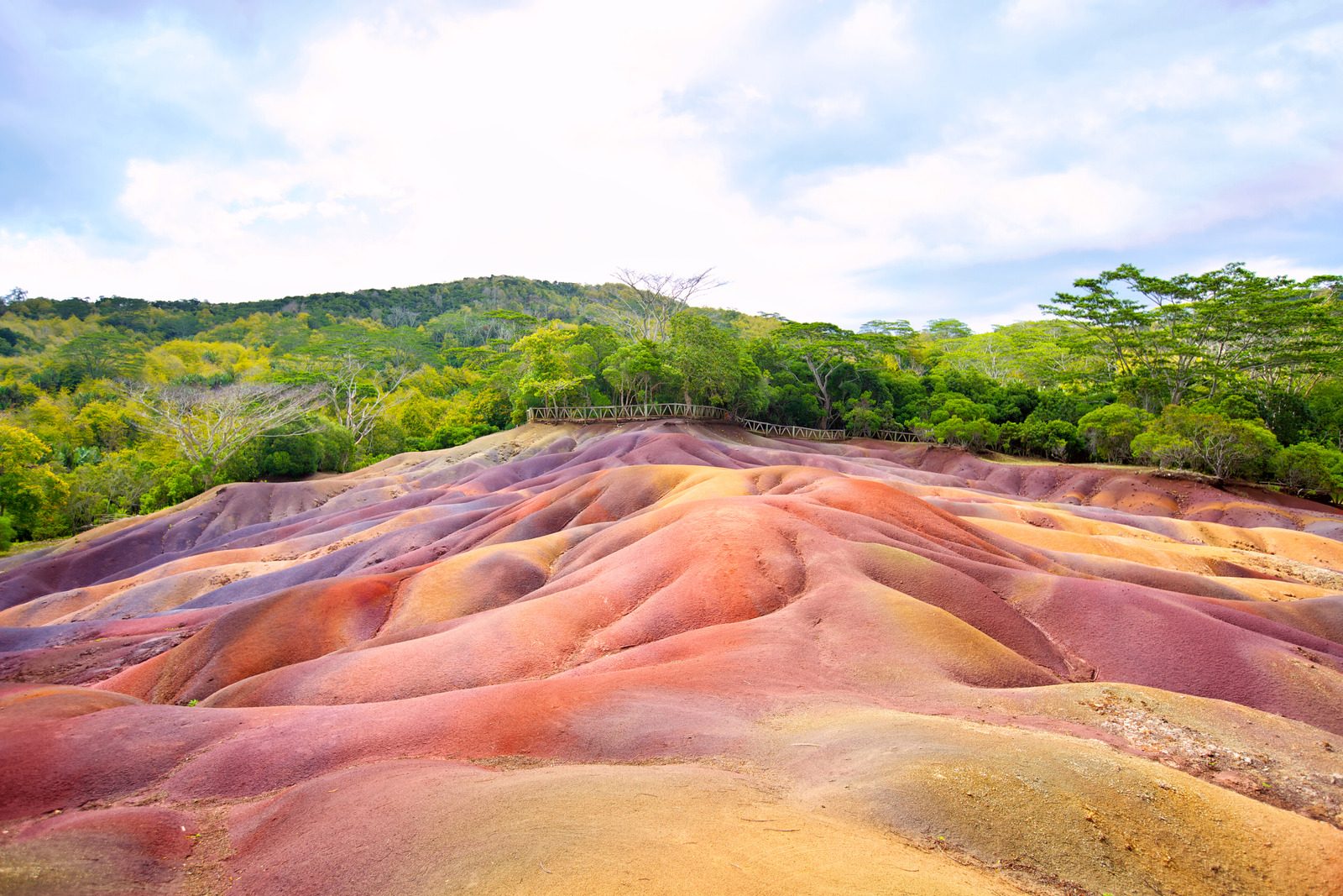 A scenic view of Chamarel Seven Colored Earths in yellow