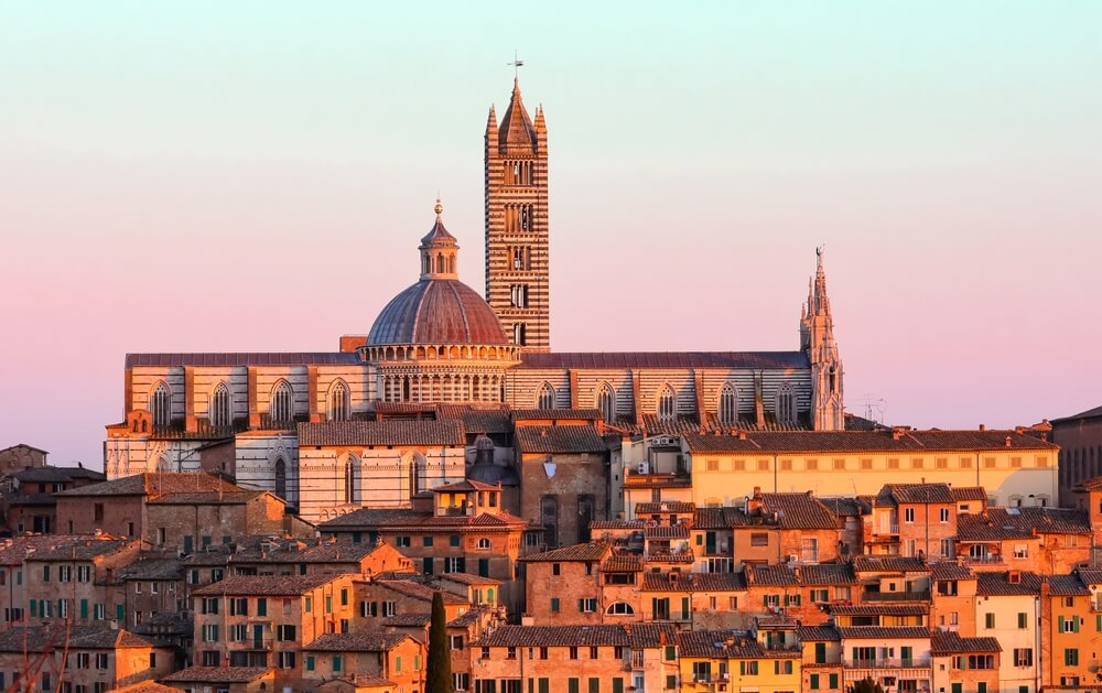 Cathedral,Of,Siena,In,Tuscany,Region,In,Italy,At,Sunset